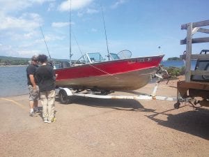 As boaters head out for a last day of fishing, they are reminded of the importance of cleaning, draining and drying boats and equipment to prevent the spread of aquatic invasive species (AIS). This boater at the Grand Marais Rec Park boat launch heard the good news that he is eligible for a free boat wash.