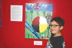 Biidaash Aubid is one of five students at Oshki Ogimaag School who participated in a special art project last May. The student art has traveled from the walls of the Grand Portage Community Center to Two Rivers Gallery, part of the Minneapolis American Indian Center. This month, the exhibit is moving to the St. Paul Public Schools Multicultural Resource Center.