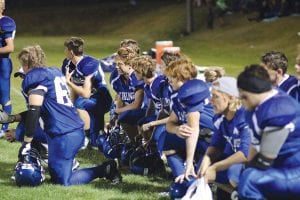 Whenever a player is hurt and play is stopped the Vikings take a knee and wait for the injured player to be taken off of the field. No one likes to see a teammate or an opposing player hurt on the field of play. It is also the only time during a game that players all remove their helmets and cool off.