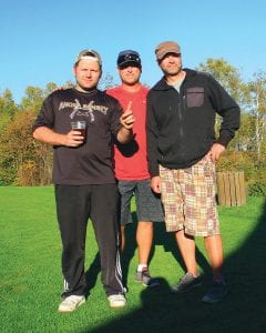 Left: The winning team at the North Shore Health Care Foundation tournament was Casey Vankreveken, Joyce Boyce and Todd Tosel. Above left: Barry Pederson (left) receives a handshake from Karl Hansen for his hole-in-one. His brother Joey came within an inch of getting a hole-in-one last year at the tournament. Above right: Voted Best Dressed was Greg Gresczyk who received $100 for the honor.