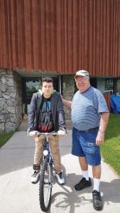 Steve Klassen, right, a representative from Thunder Bay’s Bikes for Humanity program, with one of the international workers who benefitted from this summer’s efforts. Each year a representative from Canada makes a trip to Grand Marais to pick up unused bikes not suitable for repair by the local Workers on Wheels volunteers. The Canadian participants make further repairs, and each year send two containers stuffed with bikes to South Africa for reconditioning (if needed) and loan.