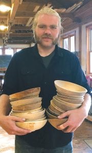 Sam Gathje, a third-generation woodworker, with some of the 50 bowls he fashioned for this year’s Empty Bowls fundraiser, which will be held Nov. 10 at Bethlehem Lutheran Church in Grand Marais.