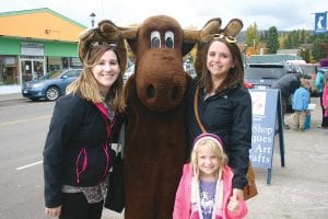 A chance trip up the shore from Duluth on Friday, October 21, turned out fantastic, said Brandy Schultz. It even resulted in their meeting Murray the Moose, who was kind enough to step in and get his picture taken with them. How could you top that? The three young ladies said they had a great time taking in the Moose Madness events, and they said they will definitely return. From L-R; Megan Caple, Murray the Moose, Brandy Schultz and in the front is Teagan Schultz, who definitely thinks Murray is one cool moose. See more Moose Madness fun on page A3.