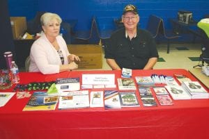 Thirty-six booths were set up at the first annual Community Connect event held Saturday, October 29 in the CCHS cafeteria and in the hallway outside. On display were information and materials promoting mental and physical health, business, and safety. More than 100 people attended the event which was held at the same time the CCHS football team was playing its Section 7A game against North Woods in Cook, which drew a lot of locals to the game. Above: Pat Strand and Clarence (Klink) Everson distributed information and answered questions about Cook County Veterans Services at the Community Connect event.