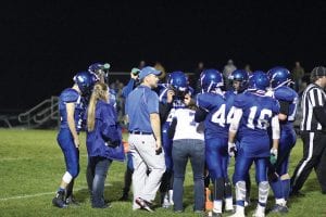 The young Vikings football team traveled to Cook, Minnesota last Saturday to play the North Woods Grizzlies in the Section 7A semi-final nine-man game, losing 52-14. The team, seen here huddling during a time out, finished with a 4-7 record in its second year playing nine-man football.