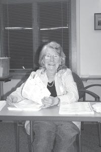 Voters who came to the Cook County courthouse on November 8 were met by a group of friendly election official like Pat Brandt (above) who were ready and eager to assist voters in any way that they could.