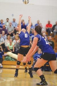 Sure handed Tarin Hanson (6) set this ball to Alyssa Lashinski (foreground) who spiked the ball over the net against Deer River for a Viking point. The Vikings took the Section 7A match in three straight games and returned to the state volleyball tournament for the second year in a row on Thursday, November 10.