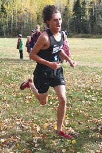 Two Harbors runners Jake Paron, left and Noah Smith, above, led the North Shore Storm at the Minnesota state cross country meet last weekend in Northfield.