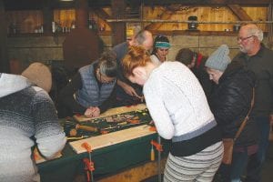 Hard at it, a group of earnest wood carvers fashioned wooden spoons and other utensils using traditional woodcarving methods and tools. This was one of 16 classes taught at Winterer’s Gathering.