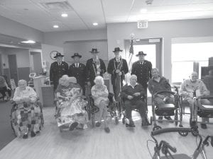 The American Legion Post 413 Honor Guard visited the Care Center on Veterans Day to honor our veteran residents. Pictured from L-R (front): Sweeney Croft, Darold Larson, Lu Pettijohn, Bob Heideman, Stan Suck, and Rolf Skrien. Members of the Honor Guard L-R: Bob Mattson, Orvis Lunke, Don Wilson, Jim Anderson, and James (Jim) Ford.