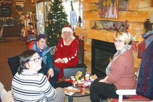 It shouldn’t come as a big surprise, but Mrs. Claus loves Christmas and loves to make Christmas tree ornaments. In fact, Mrs. Claus said Christmas is her favorite time of year. Last Friday she stopped in from the North Pole to hold an ornament making class at Sivertson’s Art Gallery. With some gentle instruction from Mrs. Claus, Joe Brooksbank, Amanda Pullinger (middle) and Julia Brooksbank were lucky enough to each make a gingerbread man ornament for their Christmas tree this year. See more holiday activities around the county on page B1.