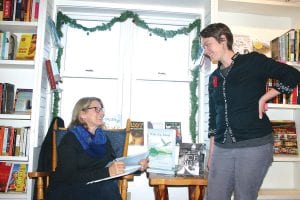 Top-selling children’s author Mary Casanova signed a copy of Wake Up Island for this adoring young fan. Casanova, from International Falls, autographed copies of her latest two books Wake Up Island and her young adult historical novel Ice-Out at Drury Lane Books on Friday, November 25.