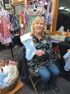 Kim Nelson uses reclaimed materials to fashion her handmade products. Kim was one of many vendors selling her wares at the Community Center in Grand Marais on November 26.