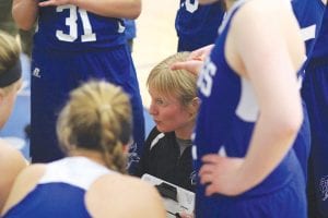 Head coach Kelly Senty talked to her players during a time out at a game played last year. Although young, the Vikings hope to improve upon their 16-8 mark last year. The team’s first home game is December 9 at 4:45 p.m. against Two Harbors.