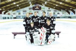 Six Cook County High School boys travel down the shore every day to practice hockey with kids from Silver Bay and Two Harbors. The three schools combine players to make up the North Shore hockey team. The team recently won two games and lost one game. In front, L-R: Cameron Roy and Chase Bronikowski. In back, L-R: Andrew Miller, Ethan Sporn, Josh Prom and Connor Somnis.