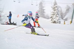 Reilly Wahlers (above) and Sela Backstrom made all the right moves, leading their team to victory at the Virginia Invite. Reilly placed first and Sela placed second in the eight-team meet to lead their team to victory.