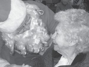 The holiday season was packed full of activity for the residents of the North Shore Health Care Center. Above, Eileen Hall is all smiles as she visits with Santa.