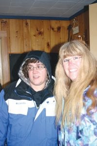 Denise Deithert (L) and Jennifer Serpico drove from Hudson, Wisconsin to take their place in line early in the morning at the Grand Marais Recreation Park office on Tuesday, January 3. People come from near and far to claim a spot at the park for the Fisherman’s Picnic weekend on the first day reservations are taken for 2017.