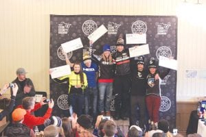 Inaugural winners of the Norpine Fat Bike Classic held last weekend in Lutsen happily hold up their prize money. The top three finishers in the long race each received cash, while the top three places in the shorter 16-mile race received awards. Local riders that took part said it was a great day to be out riding.