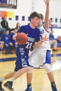 At a recent home game Will Ramberg makes a move to the basket against the Silver Bay Mariners. Ramberg is one of a nice group of sophomores for the Vikings who are improving their play each week.