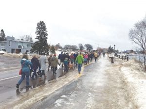 As the Women’s March in Grand Marais progressed, more and more people took part. The march started at the courthouse at 10 a.m. with a small gathering and ended about one hour later in Harbor Park with an estimated 120 people on hand.