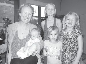 Amy Schmidt brought her family and friends to the Care Center on January 23 to entertain the residents with some wonderful musical entertainment. Pictured here is Amy with baby Kaleb, Trinity and Genesis Henneman (center), and Amy’s daughter Sparrow.