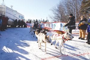 Ryan Anderson, of Ray, Minnesota, crosses the finish line in first place to take the 2017 John Beargrease Sled Dog Marathon championship. This was Anderson’s third Beargrease win. Anderson said he has been running dogs his whole life. Next up for him is the Iditarod race in Alaska.