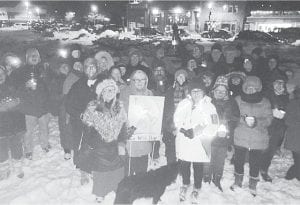 More than 40 people braved the snow and cold to attend a candlelight “Huddle” on Monday evening in Harbor Park, as an action call by the local Arrowhead Indivisible group. They gathered in support of values crucial to our nation and our democracy, including defending the U.S. Constitution, human rights, clean water and lands, affordable health care, education, workforce housing, and equality for all.