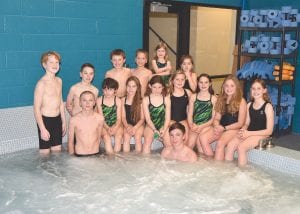 Competing for the Northern YMCA swim team are, front row from L-R: Tanner Deboer, Aurora Gallagher, Martine Redshaw, Mary June Wharton, Will Surbaugh, Liv Hedstrom (behind Will), Lexi Surbaugh, Grace Blomberg, Amelia Brune. Back row L-R: Jack Willis, Tristan Surbaugh, Isaak Lien, Silas Ekstrom, Iris Works, Kajsa Ekstrom.