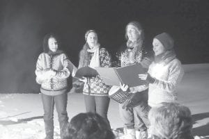 Drury Lane Books presented the SVEA singers for the Hygge weekend on Friday, February 10. Drury Lane holds Full Moon events throughout the summer and this winter bonfire was well attended by a crowd enjoying beautiful music and Swedish lessons. (left to right) Erika Ternes, Erin Swenson-Klatt, Rose Arrowsmith DeCoux, and Yvonne Mills.