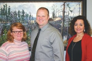 When Mike LaVigne retired at Grand Marais State Bank several people moved up in position. Mark Youngdahl became bank president, Susan Roy (L) became vice president/chief financial officer and Donna Paine became assistant vice president.