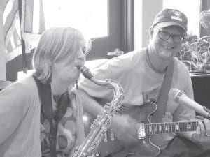 Above: Liz Sivertson and John Gruber (The Sivertones) entertained the residents with their delightful music on Valentine’s Day. Left: The residents enjoyed a painting demonstration by John Franz on Feb. 25. John donated the piece of art he created to the Care Center for all to enjoy!