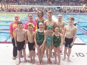 Cook County swimmers get ready for the morning warm up before the start of the state YMCA swim meet in Minneapolis. Left to right, back row to front row: Shaelyn Hingos, Aurora Schelmeske, Ella Hedstrom, Henry DeArruda Wharton, Tanner DeBoer, Jack Willis, Tristan Surbaugh, Isaak Lien, Lexi Surbaugh, Martine Redshaw and Mary June DeArruda Wharton. Missing is Liv Hedstrom.