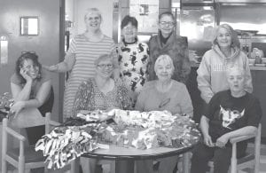 On Saturday, March 4 the Women’s Auxiliary from Grand Portage American Legion Post 2009 met for a work session to make lap blankets. Twelve fleece lap blankets along with seven handmade quilts were delivered to the North Shore Care Center in Grand Marais. Seated in the picture are (L-R) Mary Bowles, Carol Hackett and Carrie Stansfield. In the back row (L-R) are Sandra Johnston, Missy Ullman, Kathie Swader, Marie Spry and Agatha Armstrong.