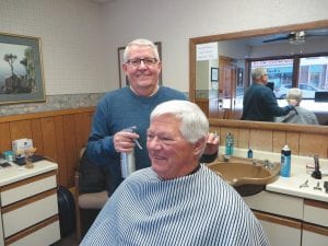 While he was getting his hair trimmed Darrell Smith reminisced with Chuck Petek about Petek’s “hair-raising” 50-year career as a barber in Grand Marais. In some cases Petek has cut the hair for three generations of Cook County men. As far as retiring, Petek said he has no intentions of putting his barber clippers away anytime soon.