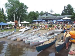 Pictured here, a large group of eager canoe racers gathered on the shore of Gunflint Lake awaiting instructions. This year the Gunflint Trail Canoe Races will be held July 19. If you are interested in volunteering to help, call Arden Byers at (218) 388-9475.