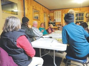 Members of the Cook County Historical Society recently met with the Grand Marais Recreation Park Board to discuss building a boathouse to display vintage Lake Superior fishing boats once used and owned by area commercial fishermen. The boats are a gift from the David Hammer family. Faces you can see, on the left are Bob Pratt, Carrie McHugh and Sally Berg. Pratt and McHugh are from the C.C. Historical Society.