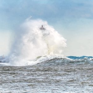 It’s not often that Lake Superior kicks up a storm like the one it did on March 9-10, with waves rising at times over the Coast Guard lighthouse. Much of that wavewater froze to whatever it hit and turned the whole area into a sea of ice crystals that shimmered brightly in the cold sunlight.