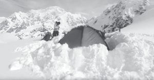 It’s not the Hilton, but this red tent and the snow piled round it keeps Lonnie Dupre and Pascale Marceau safe from the cold and ferocious winds that often blow across the mountain during their attempt to scale Mount Carpe. The duo came close, but couldn’t reach the summit and came back down the mountain.