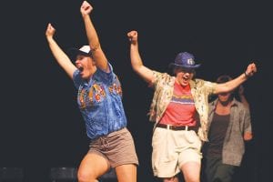 Tarin Hanson and Emily Jacobsen (right) wildly celebrate in one skit.