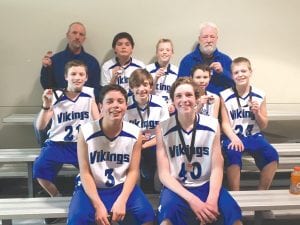 The CCHS boys’ junior high basketball team had a fabulous year, ending with a 21-3 record. Starting in back L-R: Coach Rick Crawford, Caide Northrup, Paul Dorr, and Coach John Jacobsen. Middle row L-R: Tate Crawford, Derrick Seidel, Isaac Sandstrom, Jacob Dorr. Front L-R: Kewadin Pierre and Vaughn Swindlehurst.