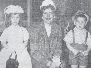 A spring fashion show was held just in time for the Easter holiday in April 1960 at the East Bay Hotel. One of the many well-dressed families to participate in the annual event that featured clothing and fashions sold in local stores was the Thomases, represented by Mrs. Lee Thomas (center) and her children Leah, 4 (left) and Eric, 3. Also helping with the festivities (inset) was Harley Tofte, 4, who showed off an outfit that his uncle, Howard Joynes, sold at his store.