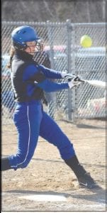 Above: Abbie Crawford took a big swing, fouling off this ball. Right: Going into her full windup, Viking pitcher Hannah Toftey gets ready to deliver a pitch against the Silver Bay Mariners with Ella Sporn looking on.