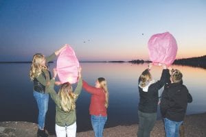 A large group of friends and family paid tribute to Gunnar Anderson on Saturday, April 15 at Harbor Park, lighting and sending up lanterns and prayers in his memory. Gunnar, a good-hearted well-liked young man, perished in a freak snowmobile accident this winter. He would have turned 23 on April 13.