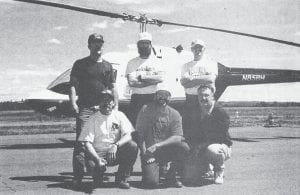 This local helicopter firefighting crew was pictured in the June 23, 1997 issue of the News-Herald. Front row, from left, are Tom Westby, Grand Marais; Brian Henry, Tofte; Paul Schuldeisz, Brainerd (helicopter mechanic); standing are Jerry Notler, St. Croix Falls, Wis. (pilot); Mike Schelmeske, Grand Marais; and Steve Williams, Grand Marais. The crew was one of four put on standby by the U.S. Forest Service and the state DNR due to a lack of rainfall, which as of mid-June was three inches below normal.