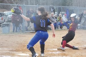 Abbie Crawford (11) made a nice play at the plate, tagging out the Barnum runner who was trying to score.