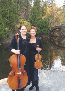 Christina Roytz Branham on cello and Michelle Gribbon on violin will perform at the Grand Marais library at noon on May 25.