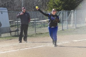 Above: Playing third base, Vikings’ senior Maranda Deschampe made a nice catch and throw to home in the game against the Two Harbors Agates. Left: Playing second base, Ella Sporn throws to first base to get the Agate runner.