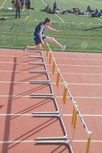 Showing great hurdling form is Vaughn Swindlehurst. Vaughn won first place in the junior high track meet held in Esko on May 10.