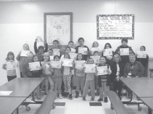 It was a happy day when the Oshki Ogimaag students received their reading certificates. Appearing with the students are Elder volunteers Arvid Dahl, Agatha Armstrong and Patty Winchell-Dahl. Throughout the year Elders spend several hours per week helping in the classroom. Kids not only get help with reading but they learn to respect and value their Elders. Meanwhile the Elders, who help the children with many projects throughout the year, get to know the kids and experience the exuberance, energy, and excitement kids bring to pretty much everything they do.